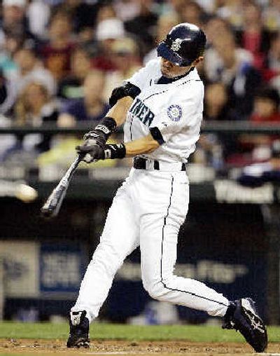 
Seattle's Ichiro Suzuki slams a 3-run homer.
 (Associated Press / The Spokesman-Review)