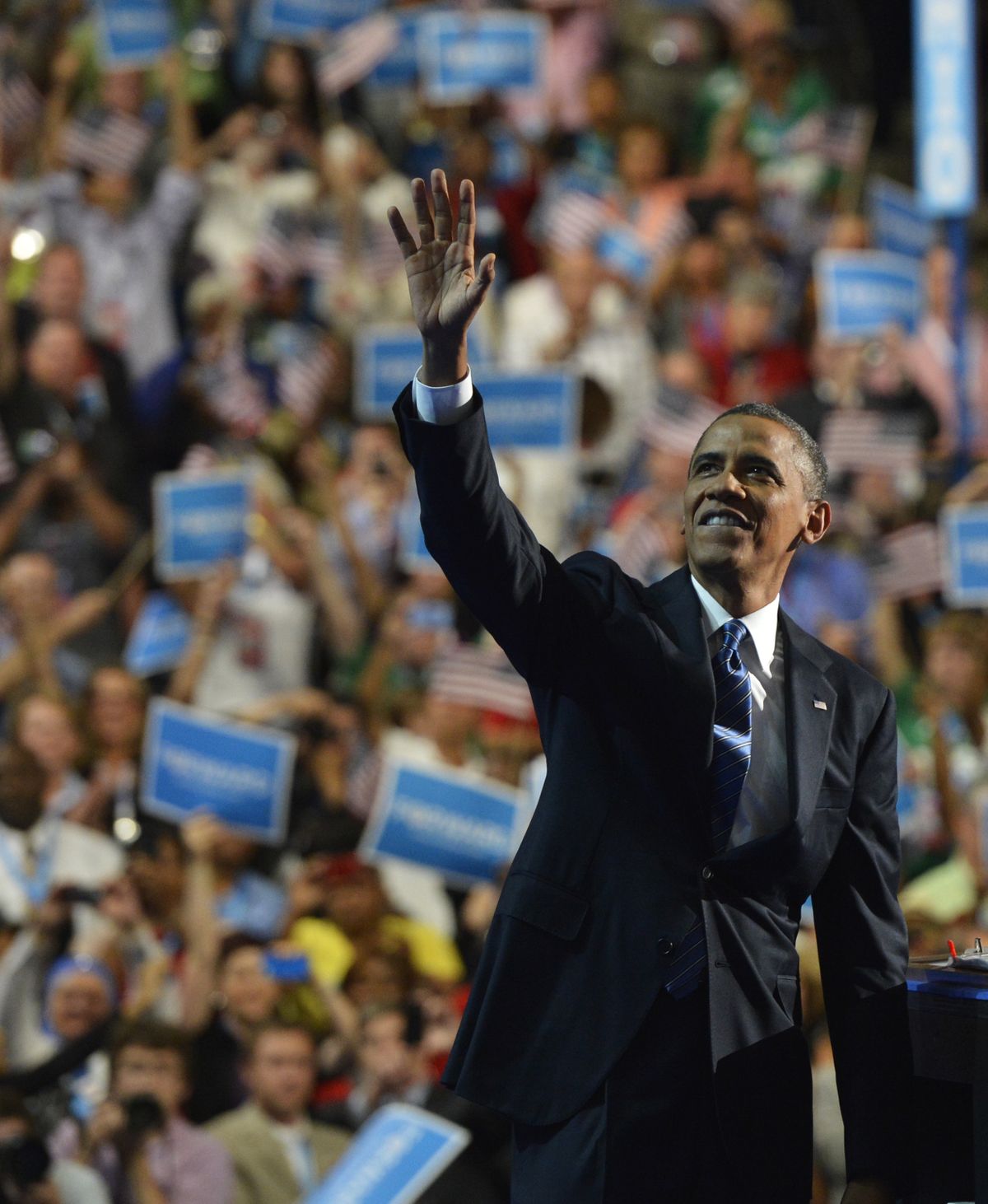 President Barack Obama waves to the delegation after his speech at Time Warner Cable Arena in Charlotte, N.C., on Thursday.