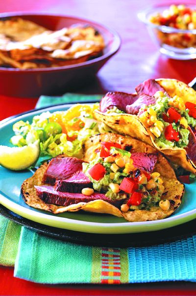 Rubbing beef with just a few ingredients adds another layer of flavor to grilled entrees like this recipe for Cumin-Seasoned Steaks with Spicy Grilled Corn Salsa, a recipe created by the Washington State Beef Commission. 