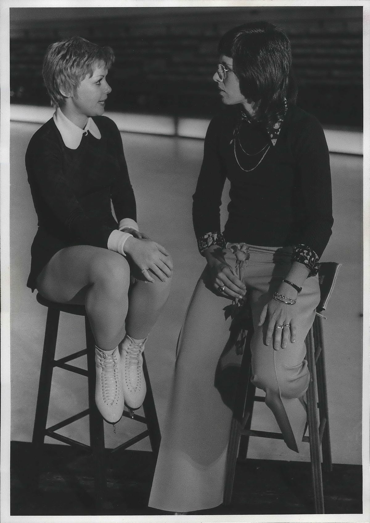 Original caption from Dec. 28, 1974 Spokesman-Review: Two champs meet in SpokaneWomen in sports was the topic Friday when tennis star Billie Jean King, right, and Karen Magnussen, Canadian and world figure skating champion met. Miss Magnussen is in Spokane as one of the stars of the Ice Capades at the Spokane Coliseum. Mrs. King flew in to interview the skater for a television sports program.  (Spokesman-Review archives)