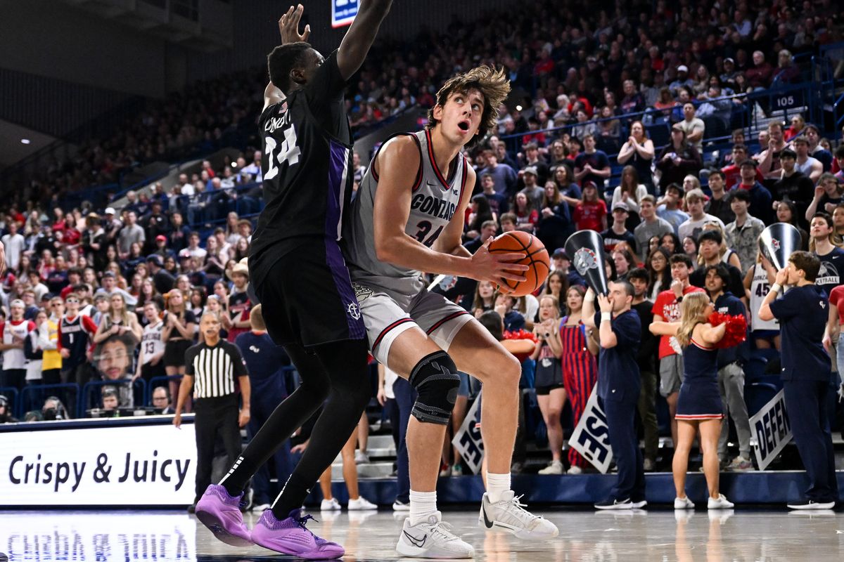 Gonzaga’s Braden Huff makes a move against Portland’s Bol Dengdit on Wednesday.  (By Tyler Tjomsland/The Spokesman-Review)