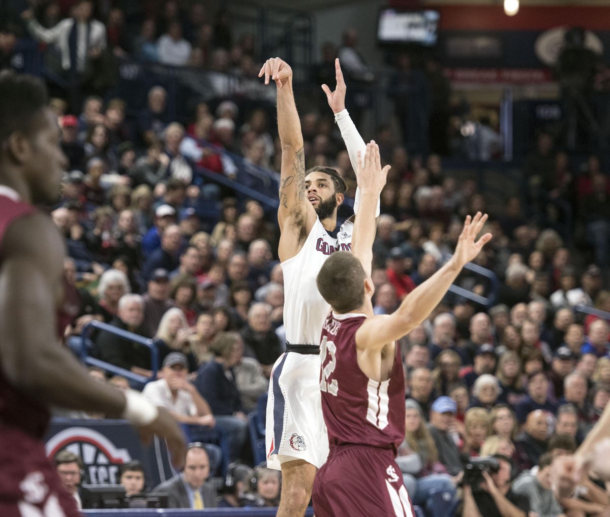 Gonzaga guard Josh Perkins hits a 3-point shot against Santa Clara, Saturday, Dec. 30, 2017, in the McCarthey Athletic Center. (Dan Pelle / The Spokesman-Review)