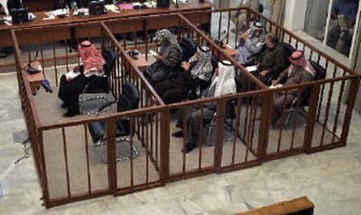 
The chair of Saddam Hussein is empty  at his trial in Baghdad on Wednesday. 
 (Associated Press / The Spokesman-Review)