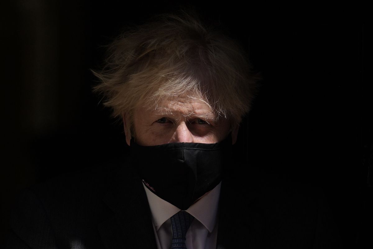 British Prime Minister Boris Johnson leaves 10 Downing Street to attend the weekly Prime Minister