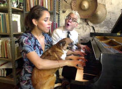 
Thomas Lauderdale, right, pianist and leader of the band Pink Martini, plays around at the piano in his loft apartment with vocalist China Forbes while she holds Foxy in her lap. Based in Portland, Pink Martini has won international accolades for its melding of jazz, classical, French cafe standards and Afro-Cuban rhumba. 
 (Associated Press / The Spokesman-Review)