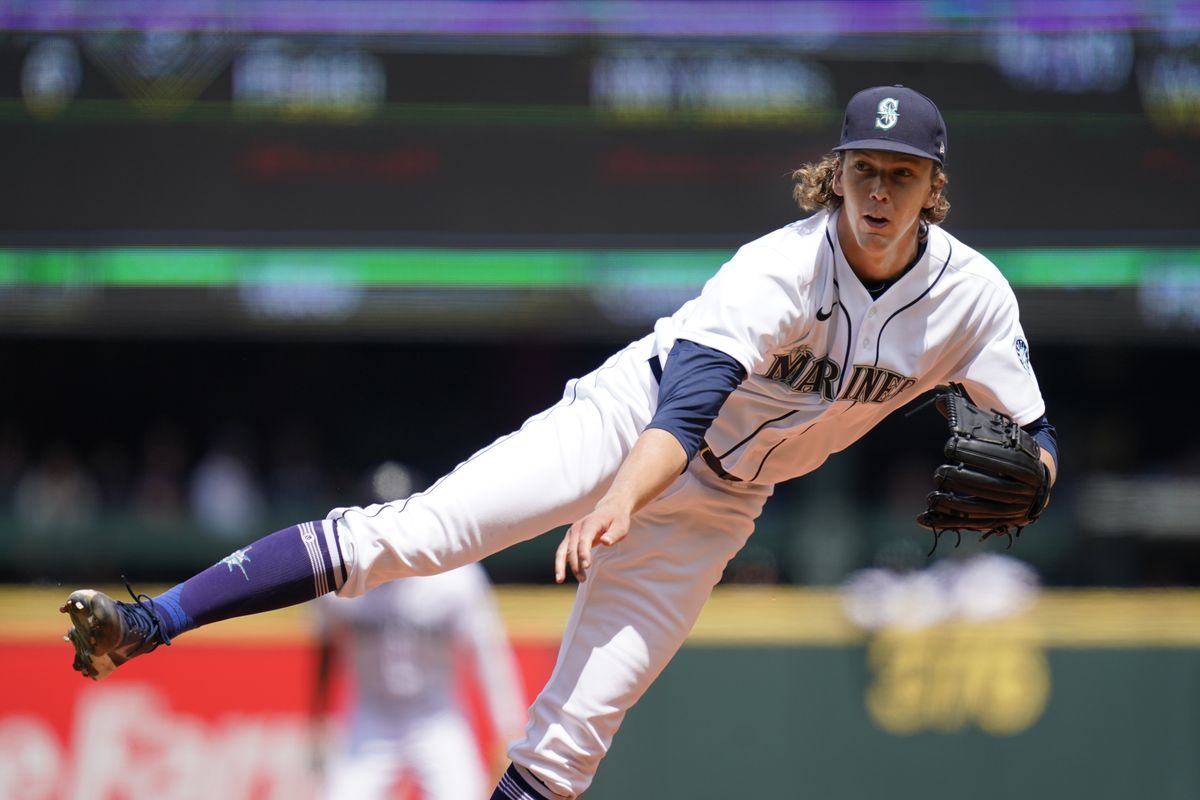 Seattle Mariners starting pitcher Logan Gilbert follows through on a pitch against the New York Yankees in the second inning of a baseball game Thursday, July 8, 2021, in Seattle. (Elaine Thompson)