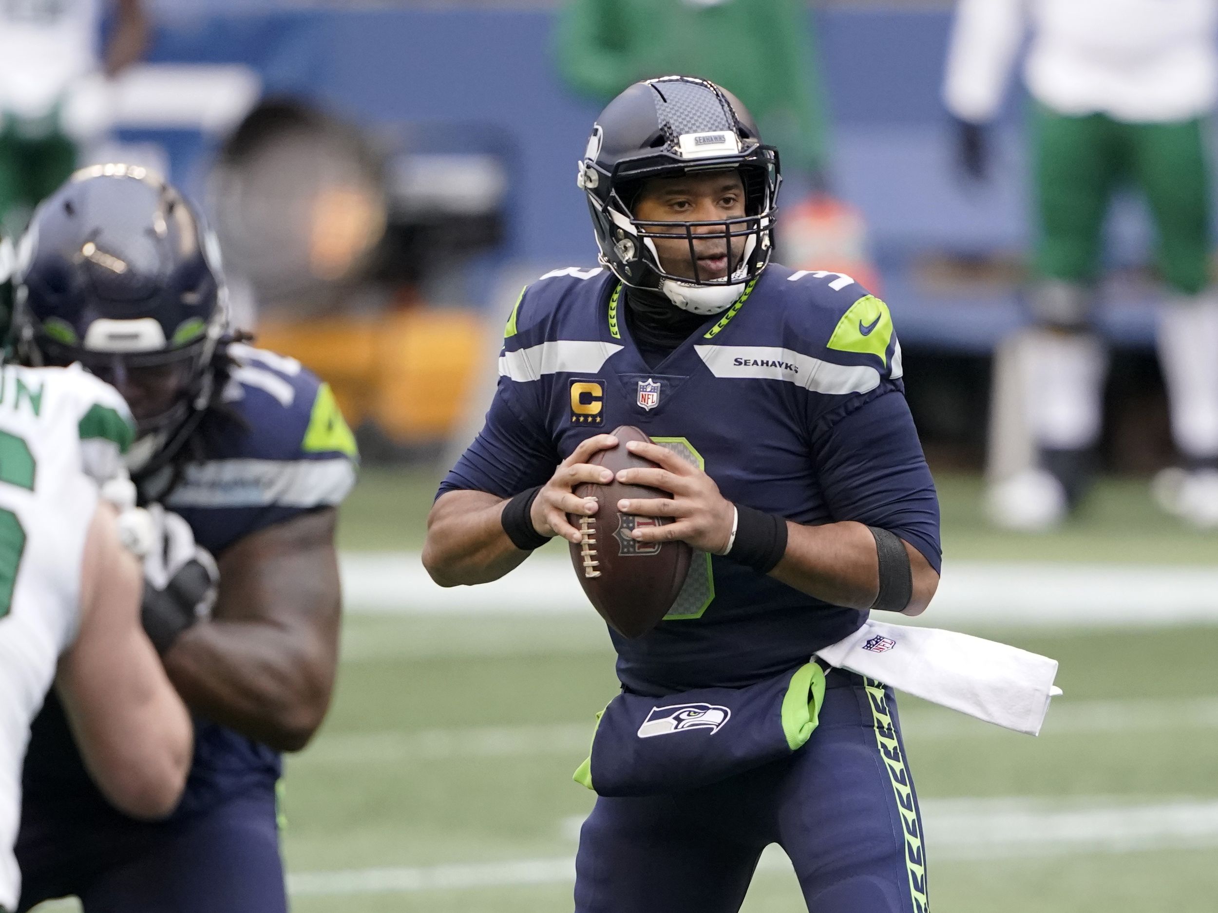 Seattle Seahawks linebacker Jordyn Brooks (56) looks downfield during an  NFL football game against the Las