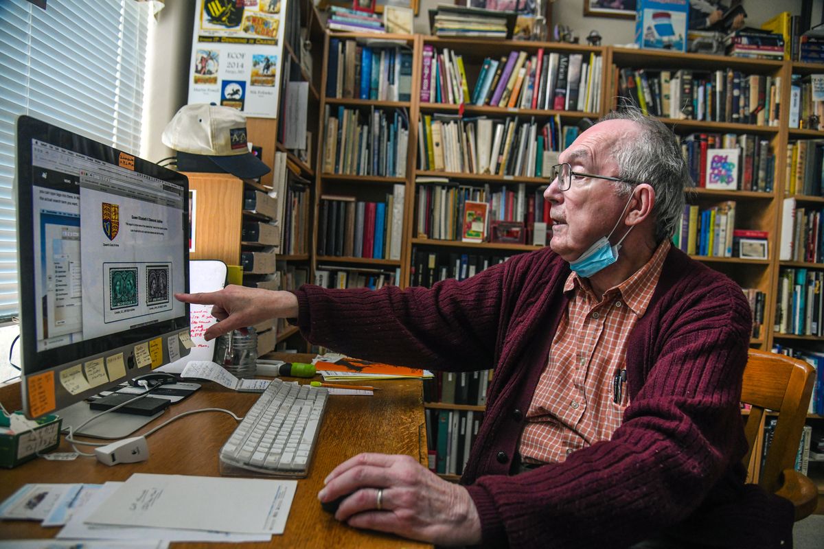 Myron Molnau spends many hours working with his stamp collection on his computer.  (Dan Pelle/THESPOKESMAN-REVIEW)