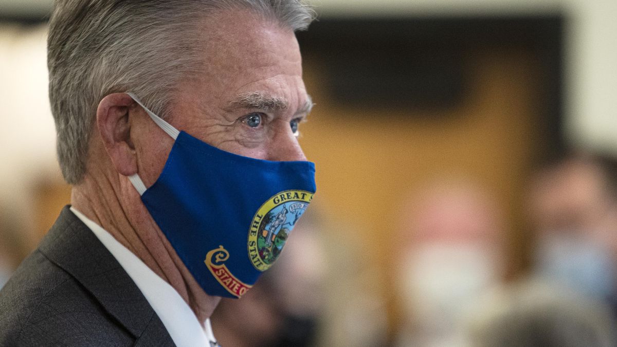 Idaho Gov. Brad Little wears a protective mask Sept. 18 printed with his state’s flag in Boise before announcing a COVID-19 reopening plan. (Darin Oswald)