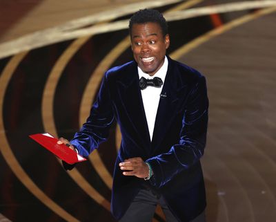 Chris Rock speaks onstage during the 94th Academy Awards at the Dolby Theatre in Hollywood, Calif., on March 27.  (Tribune News Service)