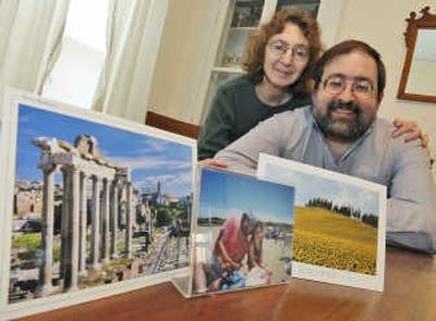 
Dena Feldstein Brody and her husband, Edward Brody, of  Cambridge, Mass., display  postcards from a 2006 trip to Italy and a 1996 photo of Edward with their daughter, Anna Brody, on Martha's Vineyard. Associated Press
 (Associated Press / The Spokesman-Review)