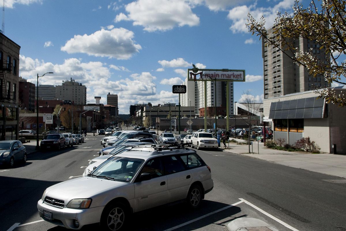 A Spokane pilot project that put angled parking in the middle of West Main Avenue between Division and Brown streets is “a train wreck,” developer Jim Frank said. “If you want more cars, you just plan for more cars. ... If you want more people, you need to plan for more people.” (Kathy Plonka / The Spokesman-Review)