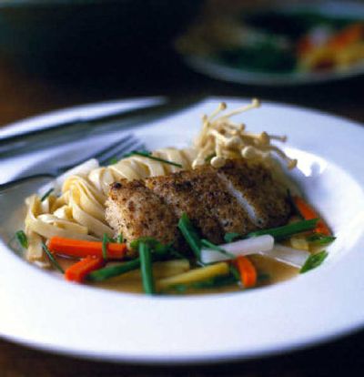 
This Seared Cod in a Rich Broth with Vegetables is a favorite on the New England Atlantic coast. 
 (Associated Press/Culinary Institute of America/Ben Fink / The Spokesman-Review)