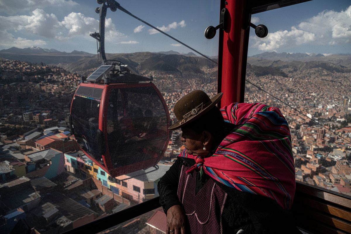 A woman rides the cable car from El Alto to La Paz, Bolivia, on Thursday. MUST CREDIT: Marcelo Pérez del Carpio/For The Washington Post (Marcelo Perez del Carpio/For The Washington Post)