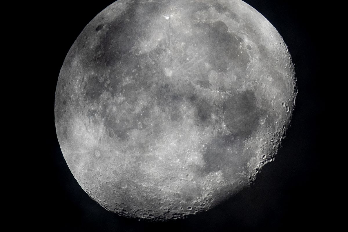 FILE - In this early Monday, Oct. 5, 2020, file photo, a waning moon is seen at the sky over Frankfurt, Germany. The moon’s shadowed, frigid nooks and crannies may hold frozen water in more places and in larger quantities than previously suspected, good news for astronauts at future lunar bases who could tap into these resources for drinking and making rocket fuel, scientists reported Monday, Oct. 26, 2020. (Michael Probst)
