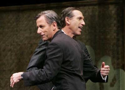 
Starbucks Corp. chairman Howard Schultz, right, gives a pat to president and CEO Jim Donald at a 2007 shareholders meeting in Seattle. Associated Press
 (FILE Associated Press / The Spokesman-Review)