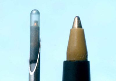 
Microchips the size of a pen tip are use to identify found pets. 
 (File/ / The Spokesman-Review)