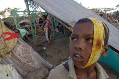 
A Bangladeshi boy, Babul, awaits treatment at Potuakhali, 95 miles south of Bangladesh's capital, on Saturday. Associated Press
 (Associated Press / The Spokesman-Review)