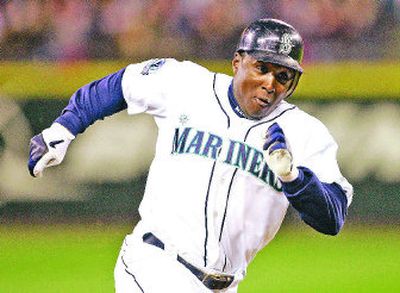 Seattle's Yuniesky Betancourt races home in the fifth inning to score. His two-run homer in the seventh broke a 4-all tie.
(Associated Press / The Spokesman-Review)