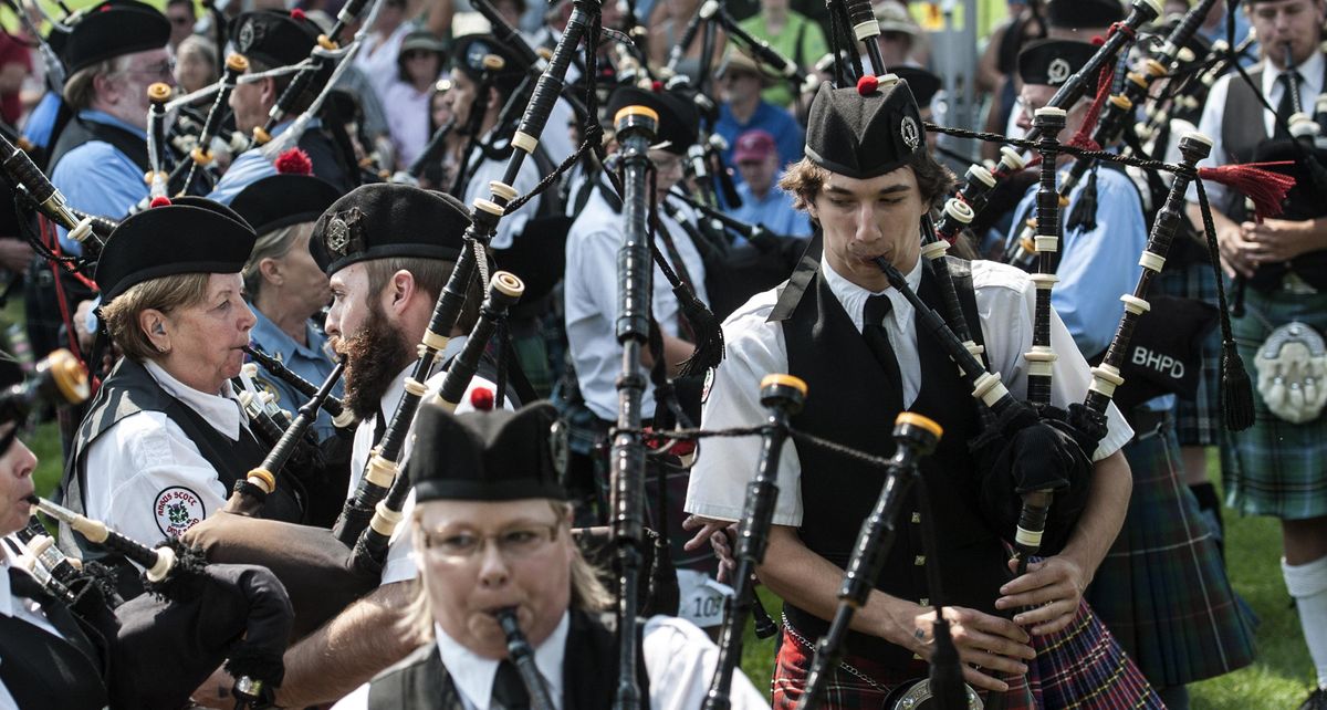 Bagpipe players perform during the opening ceremony for Spokane Scottish Highland Games at Spokane County Fair and Expo Center on Saturday, August 5, 2017. (Kathy Plonka / The Spokesman-Review)