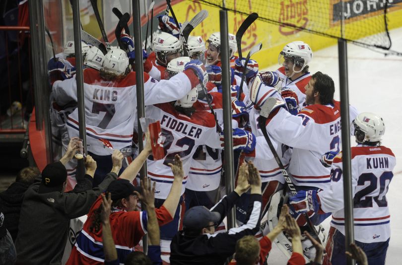 The Spokane Chiefs celebrate Friday’s 3-2 overtime win over Tri-City that tied the best-of-7 series at two wins apiece. (Colin Mulvany)