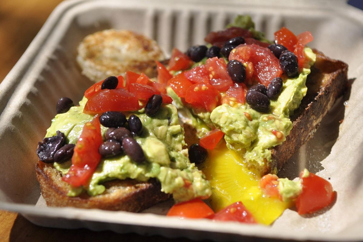 At $6.50, the avocado toast is the most expensive menu item at the Compass Breakfast Wagon, which normally can be found at Tenth Avenue and Maple Street on Spokane’s Lower South Hill. (Adriana Janovich / The Spokesman-Review)