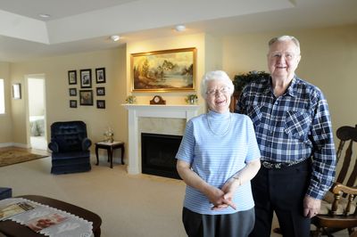 Nada and Wendell  Anglesey, shown earlier this month in their new South Hill home,  left  their large family house with stairs to move into the single-level, three-bedroom duplex.  (Jesse Tinsley / The Spokesman-Review)