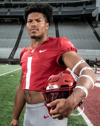 Washington State linebacker Daiyan Henley poses for a photograph on Aug. 10. Henley was selected by the Los Angeles Chargers on Friday in the third round of the NFL draft.  (Colin Mulvany/The Spokesman-Review)