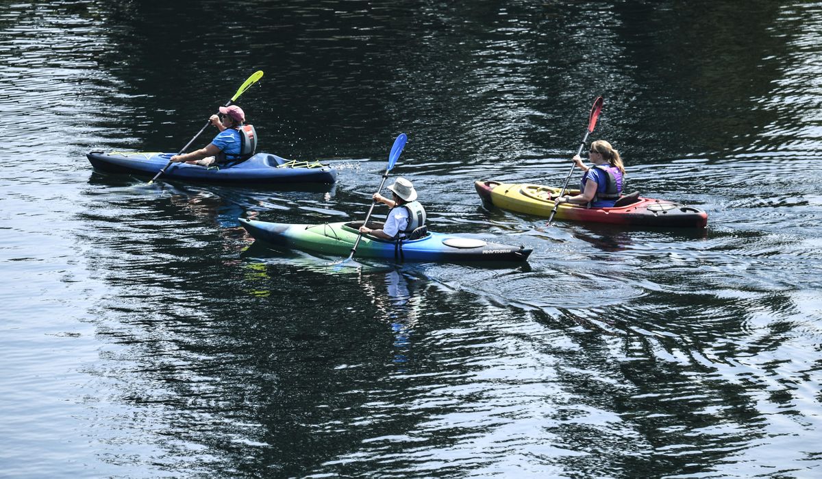 It was an afternoon outing for friends Katy Fitzgerld, Carla Burnside and Erin Kuttel as they kayak on the Spokane River on July 28.  (DAN PELLE/THE SPOKESMAN-REVIEW)