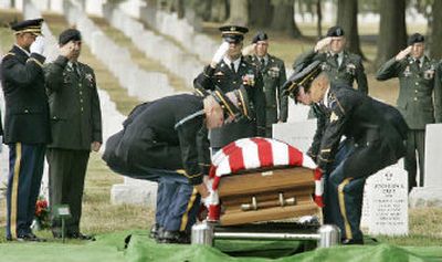 
Honor guards lay to rest National Guard Staff Sgt. William A. Allers III, 28, in Louisville, Ky. on Oct. 4. 
 (Associated Press / The Spokesman-Review)