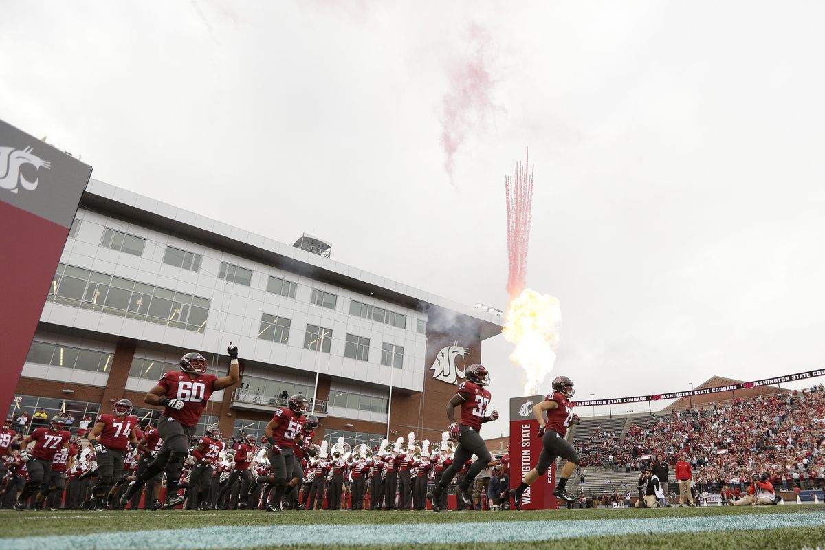 Washington State players run onto the field before an NCAA college football game against Eastern Washington in Pullman, Wash., Saturday, Sept. 15, 2018.   (Associated Press)