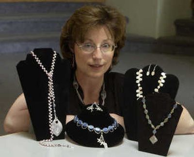 
Alicia Burgett is pictured with some of her jewelry. 
 (Photos by J. BART RAYNIAK / The Spokesman-Review)