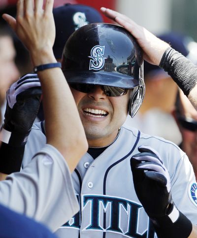 Seattle’s Jesus Montero hit two homers against Angels. (Associated Press)