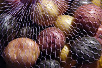 
The Spokane Farmers' Market casts a wide net on locally grown produce.
 (Holly Pickett / The Spokesman-Review)