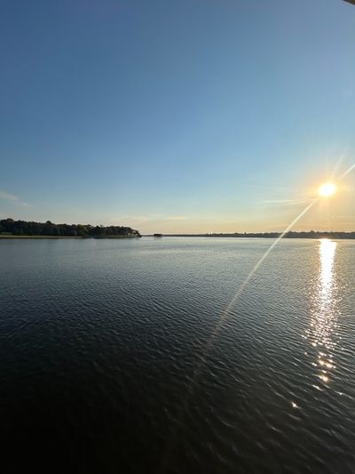 The sun sets over Cedar Creek Reservoir in Texas. A company wants to build a giant data center 400 yards from the lake.  (Gunnar Larsen/Dreamstime/TNS)