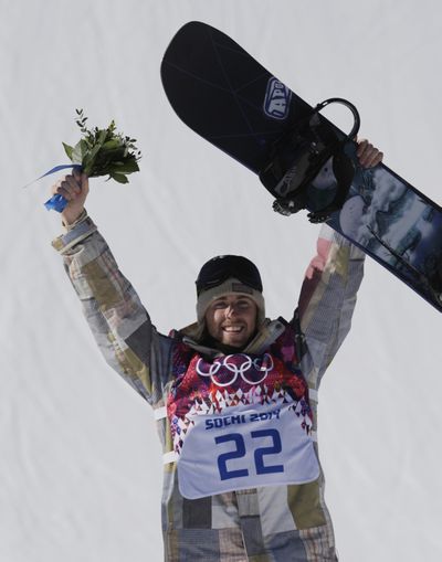 United States' Sage Kotsenburg celebrates after winning the men's  snowboard slopestyle final at the Rosa Khutor Extreme Park, at the 2014 Winter Olympics, Saturday, Feb. 8, 2014, in Krasnaya Polyana, Russia. (Andy Wong / Associated Press)