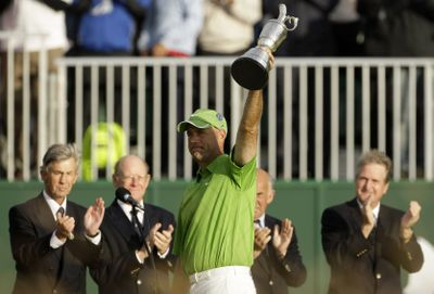 Stewart Cink hoists claret jug as R&A members look on. Top left, Tom Watson misses par putt that would have won him the championship.  Associated Press photos (Associated Press photos / The Spokesman-Review)