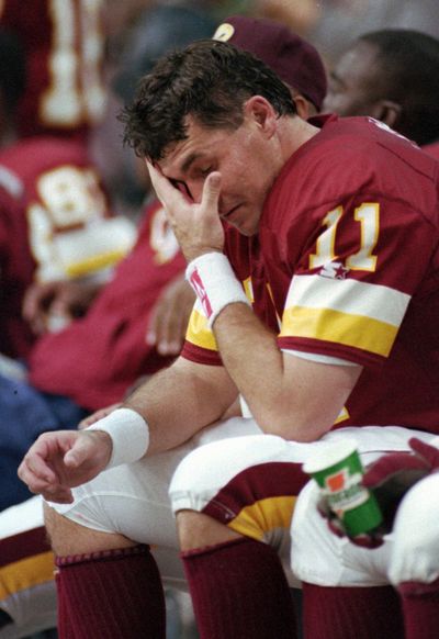 Mark Rypien said he suffered at least two or three concussions while playing football with the Washington Redskins. (Associated Press)