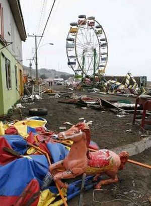 A local circus that was destroyed by the waves generated by a major earthquake is seen in Iloca, March 1, 2010. Chile's government scrambled on Monday to provide aid to thousands of homeless people in coastal towns devastated by a massive earthquake and tsunamis, as 10,000 troops patrolled to quell looting.
REUTERS/Eliseo Fernandez (CHILE - Tags: DISASTER ENVIRONMENT)
Photo Tools
