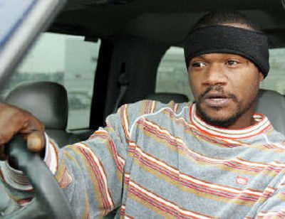 
Mark Gilmore, 34, moved his teenage son from Ohio to Georgia 18 months ago looking for more stable work at the Ford assembly plant outside Atlanta. He's regretting that decision after the automaker announced it is idling the plant. 
 (Associated Press / The Spokesman-Review)