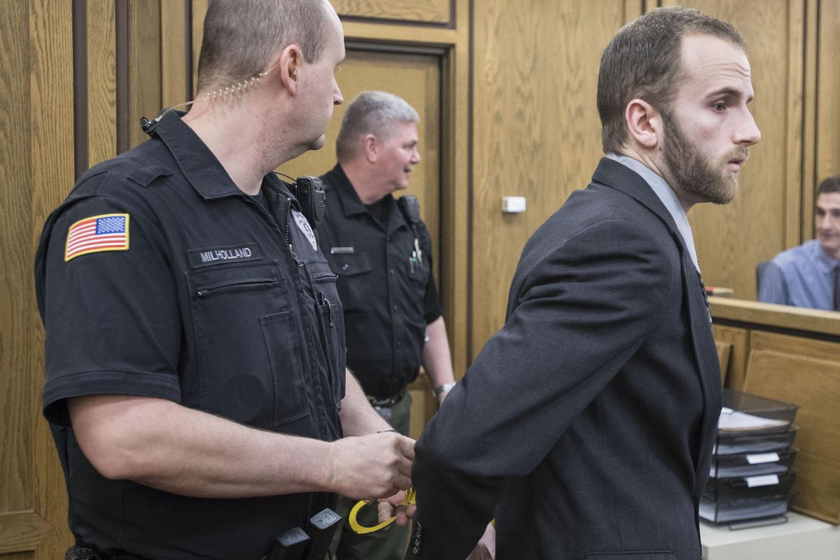 John T. Mellgren, 26, who was convicted of attempted first-degree murder, enters court, April 13, 2017, in Spokane. He was convicted of using a baseball bat to beat Robert “Drew” Schreiber, 22, a former student at Eastern Washington University and a member of the track team. Appellate judges dismissed the attempted murder conviction on Tuesday because of a technicality. (Dan Pelle / The Spokesman-Review)