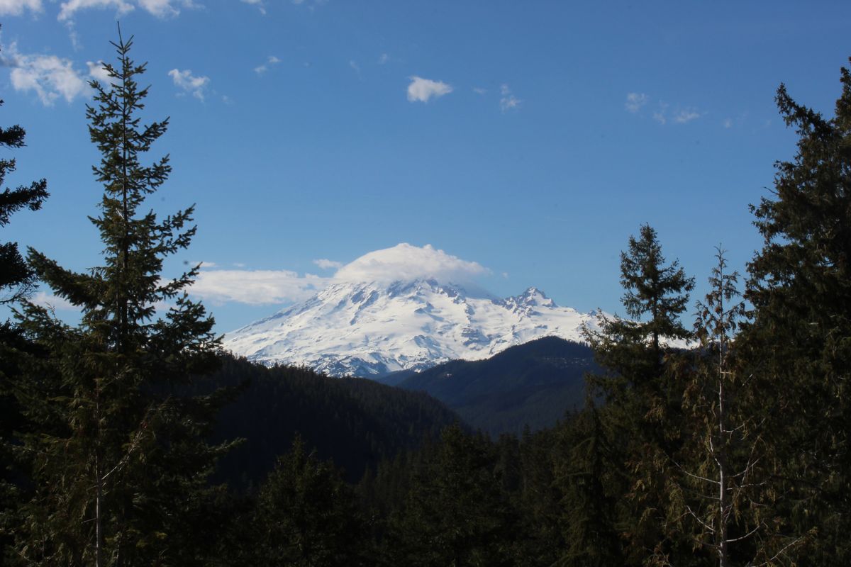 A view of Mount Rainier is shown from a scenic overlook along Hwy 12 on April 29, 2023. Rainier is one of the peaks Kilian Jornet plans to climb during his whirlwind climbing trip in the U.S. (Taylor Newquist/The Spokesman-Review)