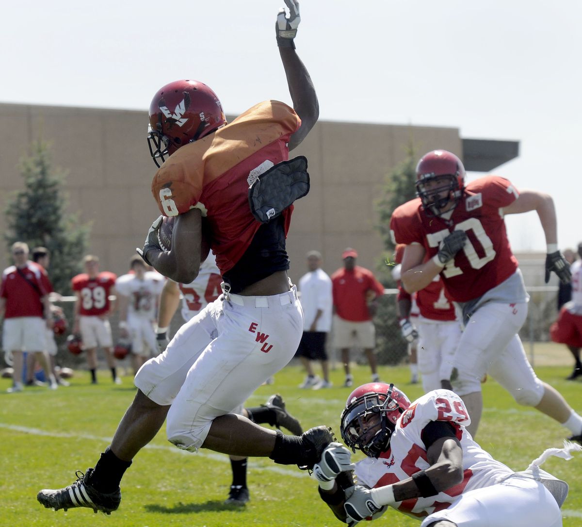 Eastern Washington running back Taiwan Jones breaks free from Jeremy Chaten on the way to a long run Saturday.  (Dan Pelle / The Spokesman-Review)