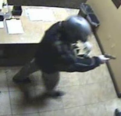 Police believe  the  Bellagio bandit  is the same man pictured here during a Dec. 9 robbery at the Las Vegas Suncoast Casino.  (Associated Press)
