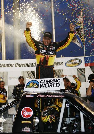 Ron Hornaday Jr. celebrates his fourth victory and his second at Kentucky Speedway. (Photo Credit: John Sommers II/Getty Images for NASCAR) (John Ii / The Spokesman-Review)