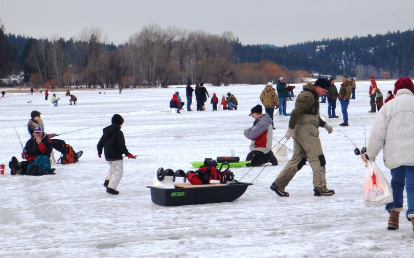 The Idaho Fish and Game Department’s “Take Me Fishing” event drew a large crowd for free ice fishing at Hauser Lake on Jan. 28.