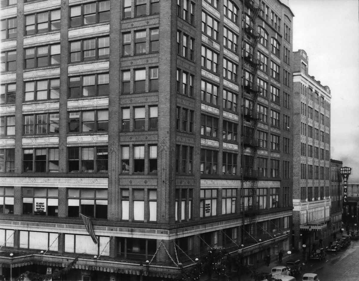 1936: The nine-story Welch Building, the headquarters of the Culbertson, Grote-Rankin department store, sat the northwest corner of Main Avenue and Howard Street in downtown Spokane since it was built in 1914. Behind the department store was an associated annex building, completed around 1919. At the north end of the block was a row of smaller buildings that became the city’s first bus depot, starting in the 1920s.  (SPOKESMAN-REVIEW PHOTO ARCHIVES)