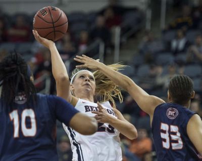 Belmont's Kylee Smith (23) goes up for a layup over Tennessee-Martin's Myah Taylor (33) during the Ohio Valley Conference tournament championship on Saturday. (Jake Crandall / Associated Press)