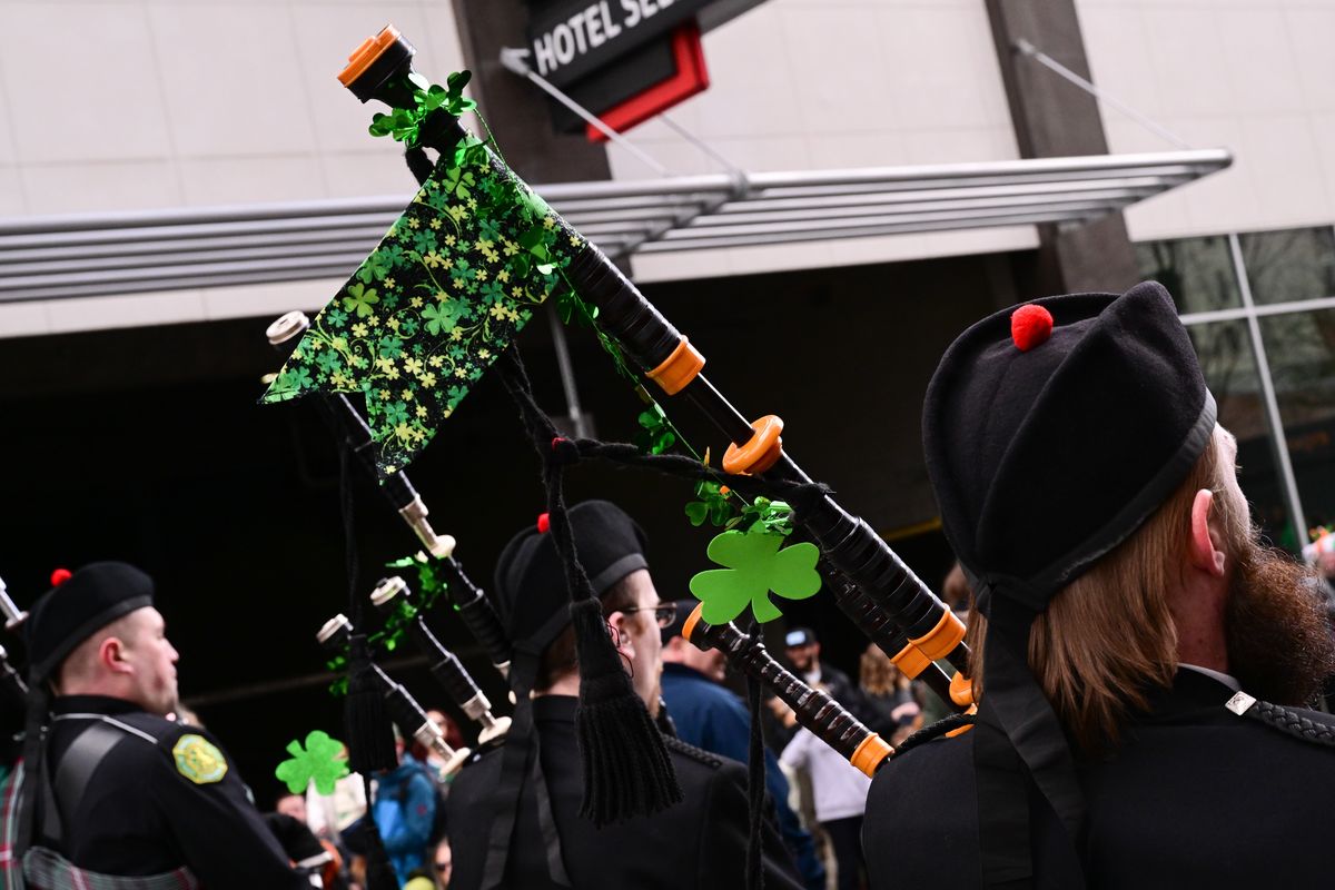 Bagpipers adorned their instruments with Irish decor during the 43rd Annual St. Patrick’s Day parade on Saturday, March 11, 2023, in Spokane, Wash.  (Tyler Tjomsland/The Spokesman-Review)