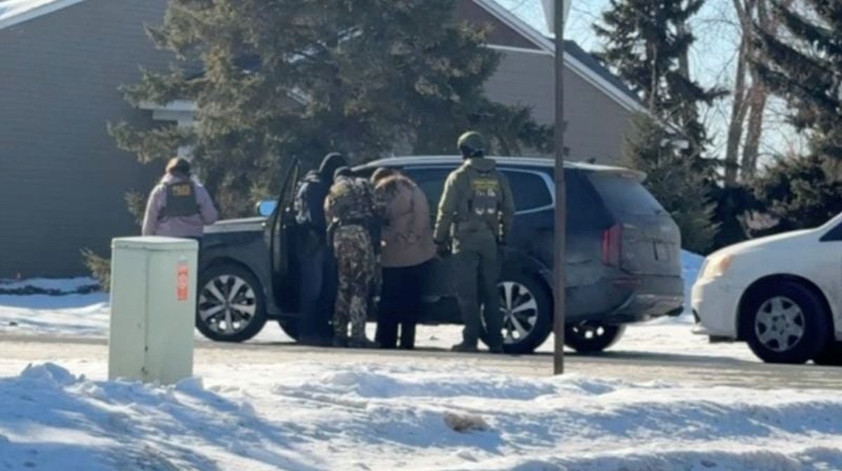 Rebecca Ringstrom is detained by federal immigration agents, as she observed an immigration enforcement operation in her neighborhood, in Blaine, Minnesota, U.S., January 29, 2026, in this screen grab obtained from a video.   (Collette Adkins)